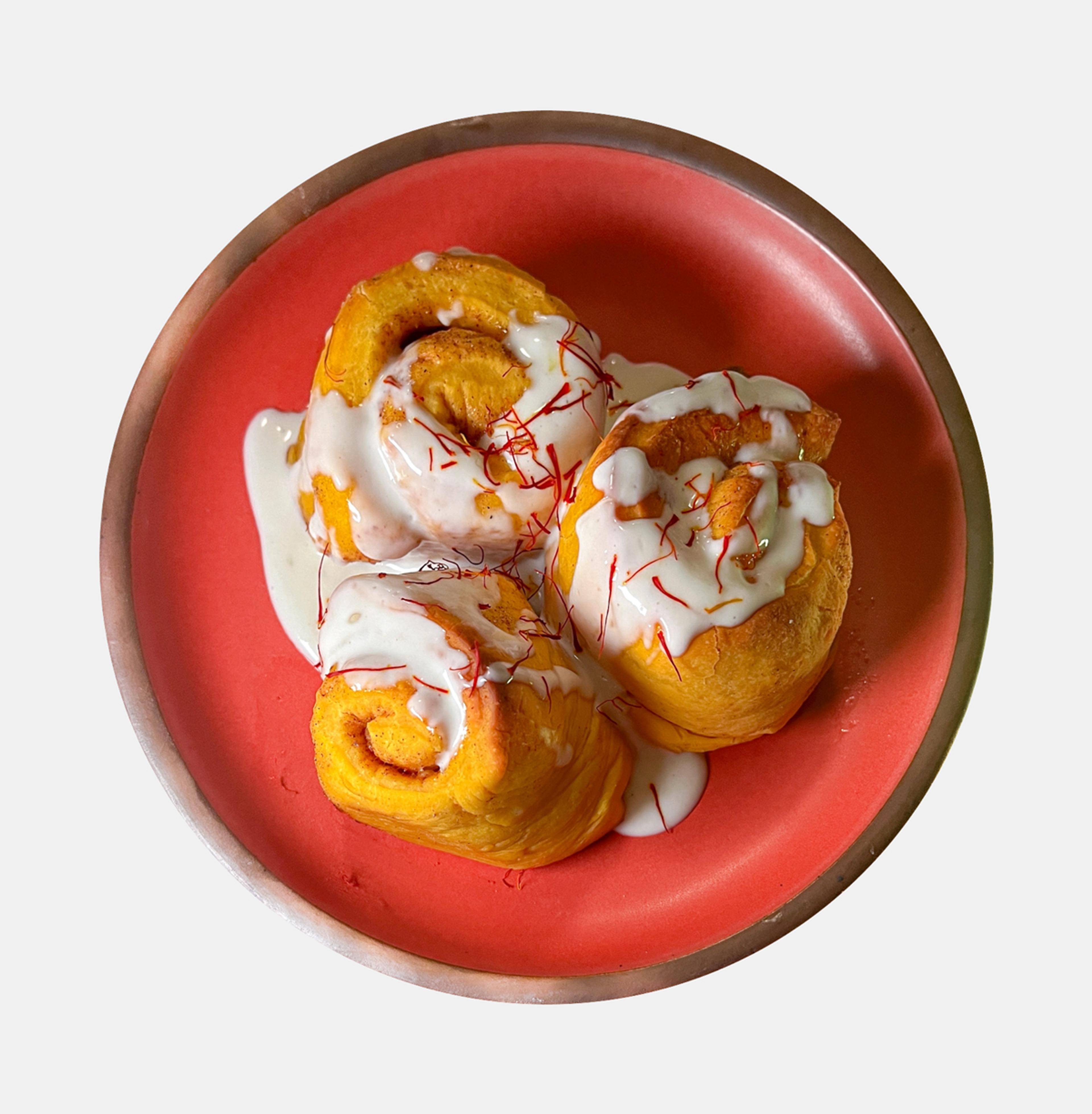 saffron rolls with labneh frosting